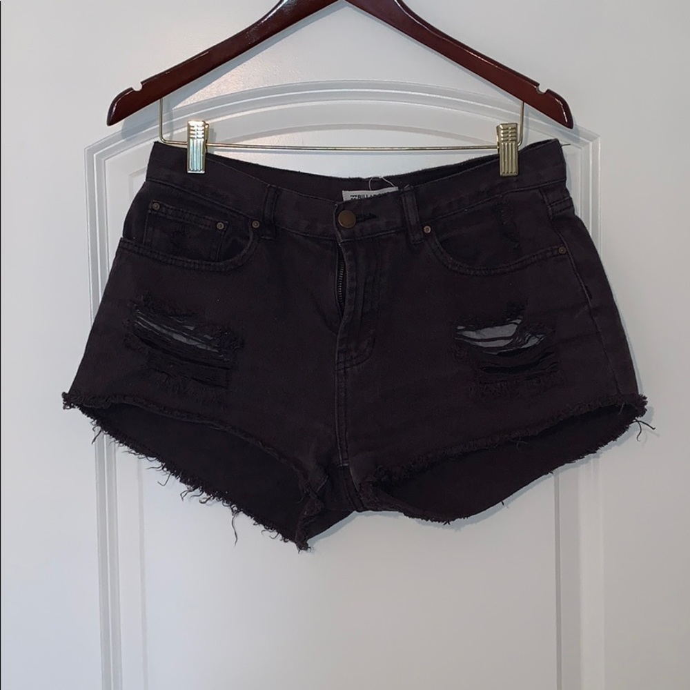 Black billabong shorts with rips Size 30